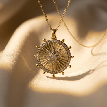 DOV 18K yellow gold Sunshine Pendant with included chain on cream satin
