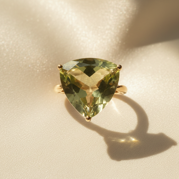 14K Yellow Gold Trillion Olive Quartz Ring top view on cream satin