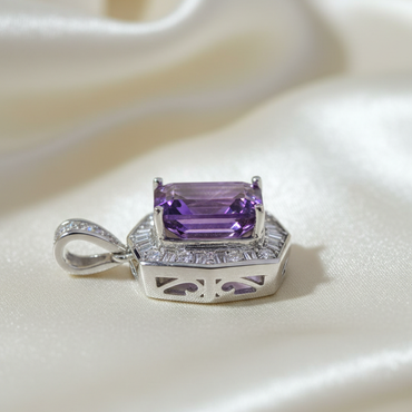14K White Gold Emerald-Cut Amethyst and Diamond Halo Pendant - side profile on cream satin