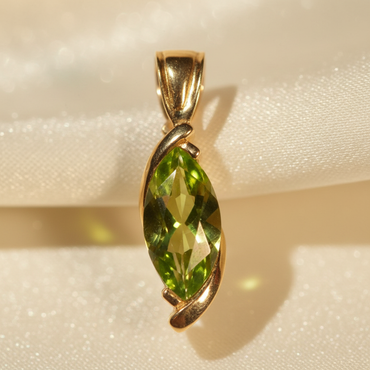 14K Yellow Gold Marquise Peridot Solitaire Pendant - Macro View