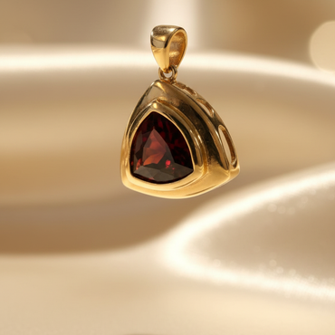 14K yellow gold trillion garnet slide pendant three-quarter view