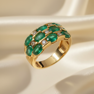 14K yellow gold three-row oval emerald and .16ctw diamond wide band ring, top-down view