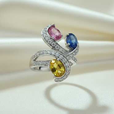 18K White Gold Three-Sapphire Pavé Diamond Swirl Ring — Three-Quarter View