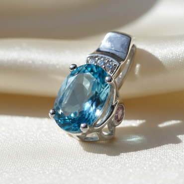 14K white gold oval blue topaz and pink tourmaline pendant, three-quarter angle