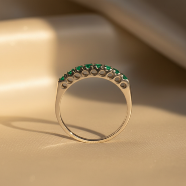 18K White Gold Eight-Stone Emerald Ring - editorial side profile