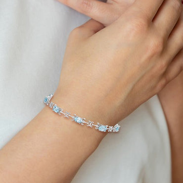 Sterling Silver Rhodium-plated Blue Topaz Oval Bracelet