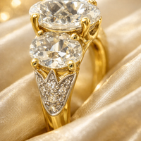 Three-Stone Oval White Topaz Ring in 14K Yellow Gold with Diamond Accents