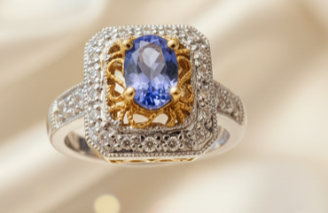 14KTT .47ctw Tanzanite & .15ctw Diamond Filigree Ring