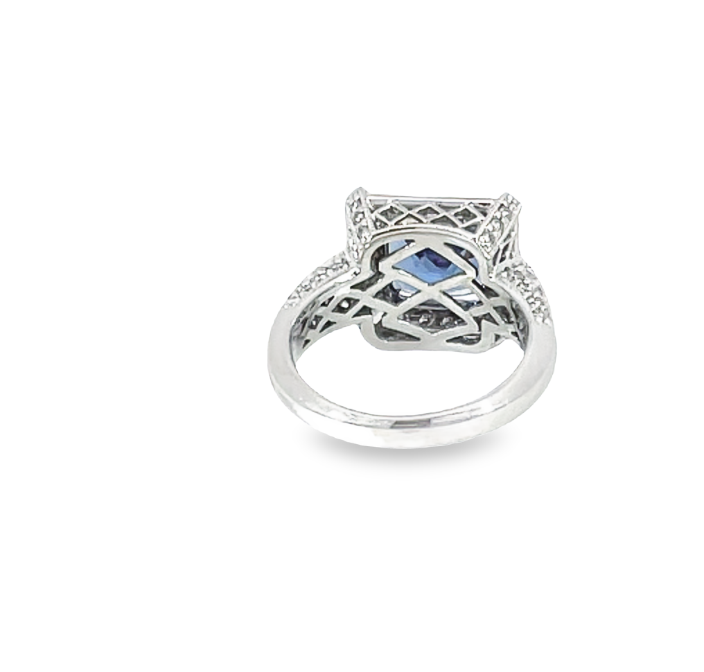 Halo Tanzanite And Diamond Ring