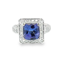Halo Tanzanite And Diamond Ring