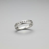 14K White Gold .10ctw Diamond Channel Band