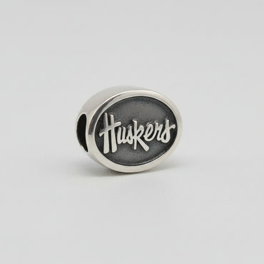 University of Nebraska "Huskers" Double-Sided Spinner Charm