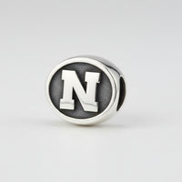 University of Nebraska "Huskers" Double-Sided Spinner Charm