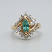 Marquise Emerald & Diamond Bypass Halo Ring
