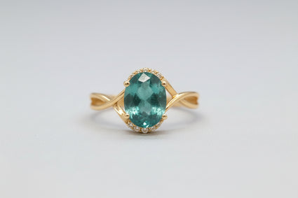 Oval Emerald & Diamond Twisted Infinity Ring