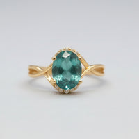 Oval Emerald & Diamond Twisted Infinity Ring