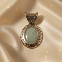 Sterling Silver Aqua Agate Cabochon Engraved Oval Pendant