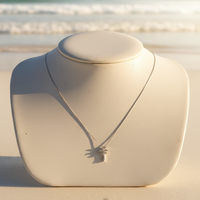 Diamond Cross Pendant on Bust - Beach