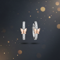 Two-Tone Pavé Diamond Huggie Hoop Earrings with Rose Gold X Accent