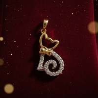 1/10 CTW Diamond Cat Heart Pendant in 10K Yellow Gold