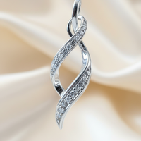 14K white gold .06ctw diamond infinity twist pendant - editorial marketing image