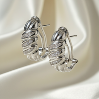 14K White Gold Diamond Swirl Dome Hoop Earrings – Three-Quarter View