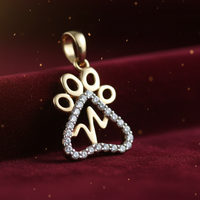 1/10 CTW Diamond Paw Print Heart Pendant in 10K Yellow Gold