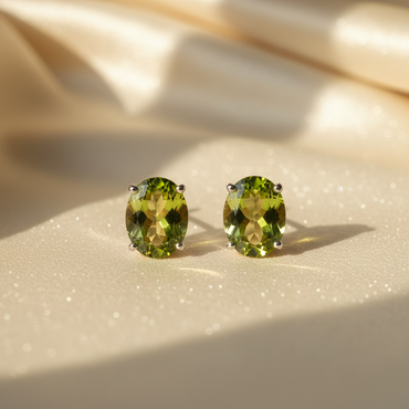 14K white gold oval peridot stud earrings 8x6mm - editorial marketing image 2