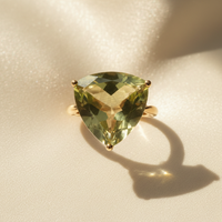 14K Yellow Gold Trillion Olive Quartz Ring top view on cream satin
