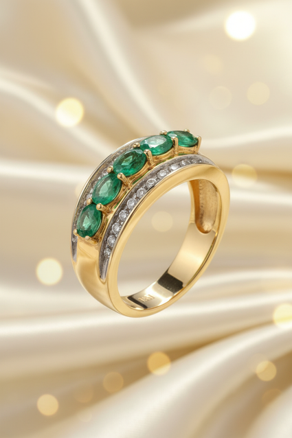 14K yellow gold five-stone emerald and .25ctw diamond channel ring, side view