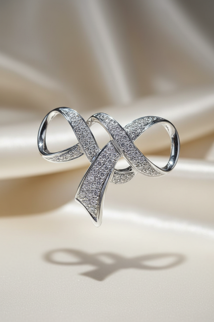 14K white gold diamond ribbon bow slide pendant editorial marketing image