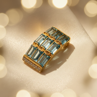 14K yellow gold blue topaz and diamond slide pendant, top-down angle