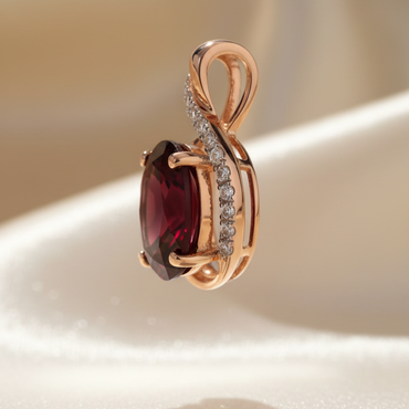 14K rose gold oval garnet and diamond pendant side profile