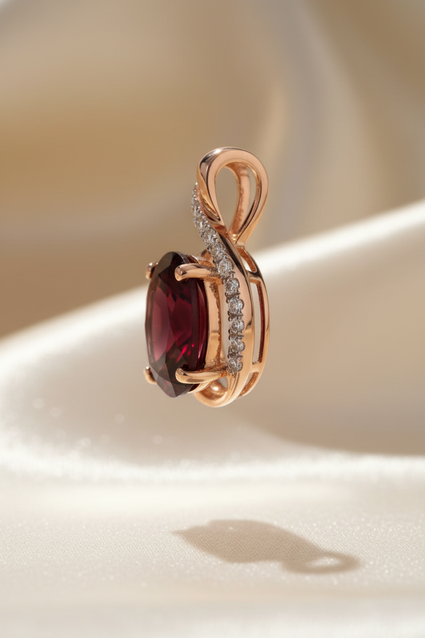 14K rose gold oval garnet and diamond pendant side profile
