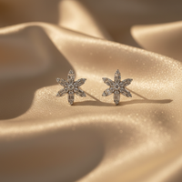 10K white gold natural diamond flower cluster stud earrings with marquise and baguette diamond petals, angle 5