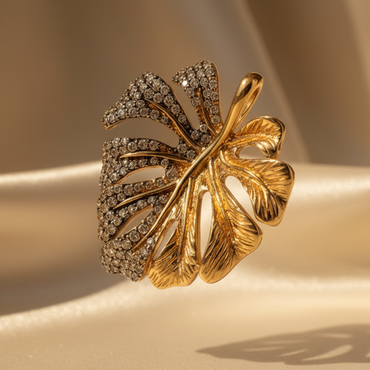 14K yellow gold .60ctw champagne diamond two-tone monstera leaf pendant, three-quarter side view