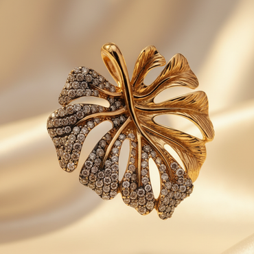 14K yellow gold .60ctw champagne diamond two-tone monstera leaf pendant, top-down view