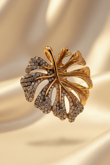 14K yellow gold .60ctw champagne diamond two-tone monstera leaf pendant, top-down view