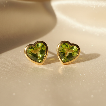 14K yellow gold heart peridot bezel stud earrings - editorial marketing image 3