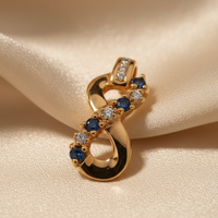 10K Yellow Gold Sapphire & Diamond Infinity Pendant – Angle View