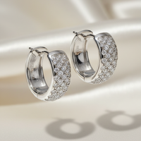 18K White Gold 0.64ctw Diamond Wide Pavé Huggie Hoop Earrings – Three-Quarter View