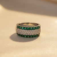 14K White Gold Emerald & Diamond Wide Dome Band - editorial low angle