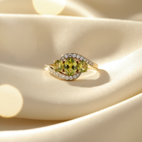 10K Yellow Gold Three-Stone Peridot & Diamond Bypass Ring - editorial side profile