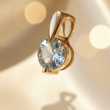 14K yellow gold 2.3ct round aquamarine solitaire pendant, elevated view