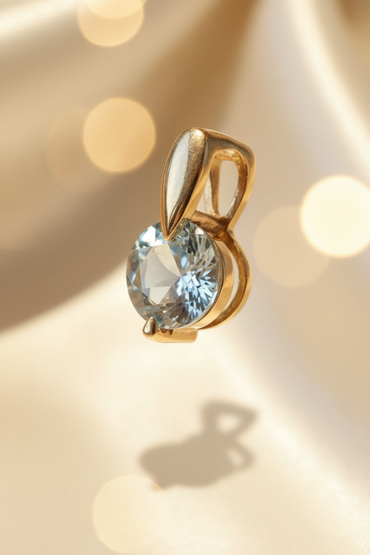 14K yellow gold 2.3ct round aquamarine solitaire pendant, elevated view