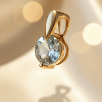 14K yellow gold 2.3ct round aquamarine solitaire pendant, elevated view