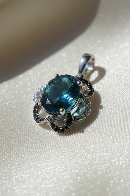 14K White Gold London Blue Topaz Black & White Diamond Halo Pendant - Angle View