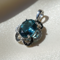 14K White Gold London Blue Topaz Black & White Diamond Halo Pendant - Angle View