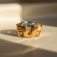 18K yellow gold aquamarine and diamond halo post earrings - side profile marketing image