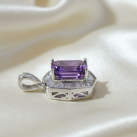 14K White Gold Emerald-Cut Amethyst and Diamond Halo Pendant - side profile on cream satin